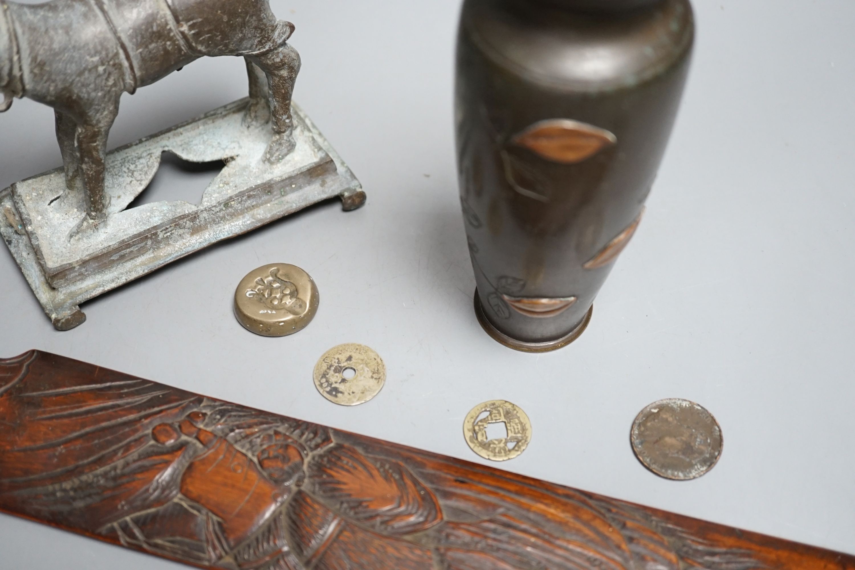 A collection of Japanese and Indian objects, largest page Turner, 46cms long.
